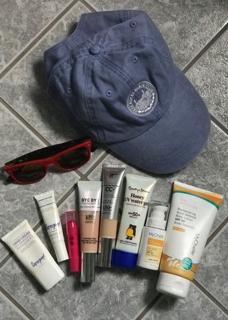 summer sun protection products for face and body including sunglasses and baseball hat, neversaydiebeauty.com