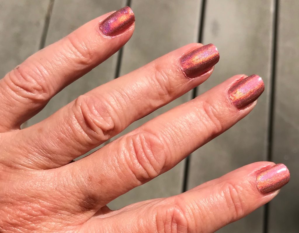 my nails in bright sunshine wearing holographic China Glaze TTYL, neversaydiebeauty.com