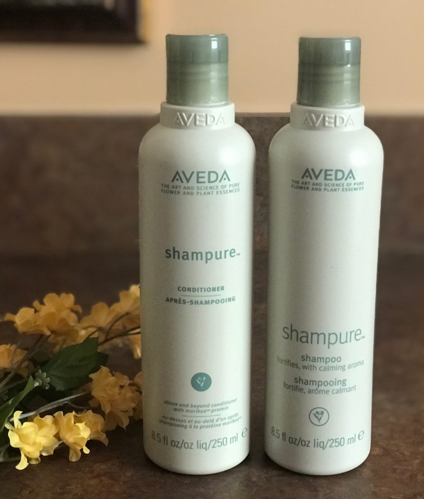 bottles of Aveda Shampure Conditioner and Shampoo, neversaydiebeauty.com
