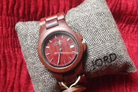 red Jord Wood Watch on presentation pillow neversaydiebeauty.com @redAllison