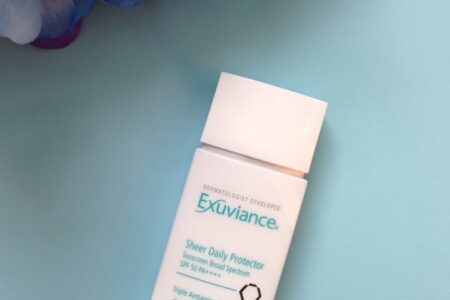 Exuviance Sheer Daily Protector SPF 50 sunscreen moisturizer neversaydiebeauty.com @redAllison