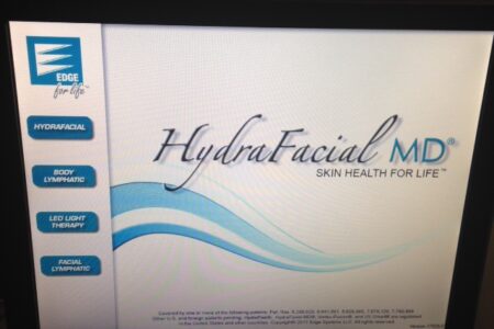 HydraFacial MD logo and device computer screen neversaydiebeauty.com @redAllison