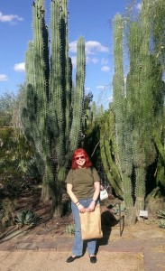 me at Desert Botanical Gardens in front of tall cacti neversaydiebeauty.com