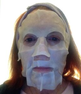 me wearing cotton SK-II Facial Treatment Mask neversaydiebeauty.com