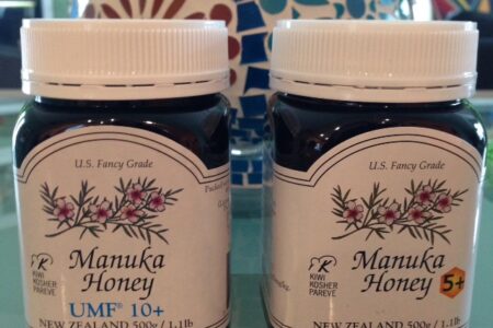 two jars of Manuka Honey from New Zealand, 5+ and UMF10+ neversaydiebeauty.com @redAllison