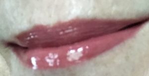 lips wearing Tarte Lip Sculptor Sass Lipstick & Gloss neversaydiebeauty.com