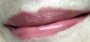 lips wearing Tarte Lip Sculptor lipstick, Sass neversaydiebeauty.com