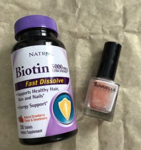 empty nail products: biotin tablets and an old bottle of nail polish neversaydiebeauty.com