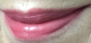 my lips wearing TATCHA Sunrise lipstick, a pink/mauve shade neversaydiebeauty.com