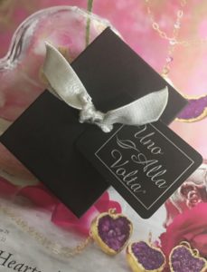 gift box on catalogue from Uno Alla Volta, online retailer, neversaydiebeauty.com