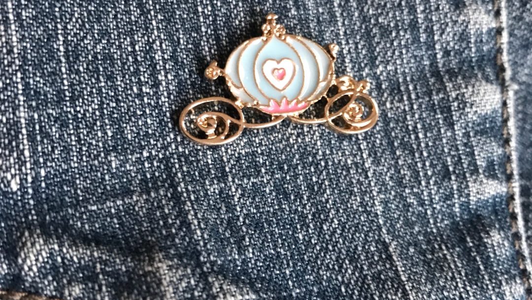 enameled pin of Cinderella's coach from Femme de Bloom, neversaydiebeauty.com