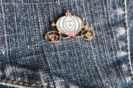 enameled pin of Cinderella's coach from Femme de Bloom, neversaydiebeauty.com