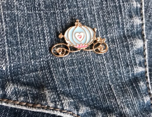 enameled pin of Cinderella's coach from Femme de Bloom, neversaydiebeauty.com