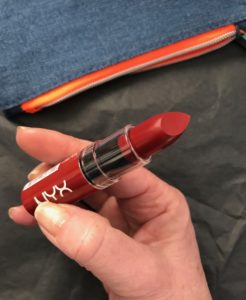 NYX Butter Lipstick in shade Lifeguard, showing the brick red bullet, neversaydiebeauty.com