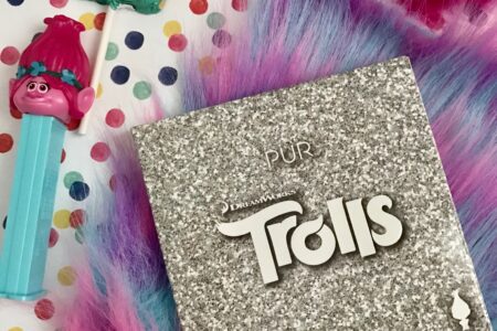 PUR Cosmetics Trolls Shadow Palette in outer packaging wi Poppy Pez dispenser & chocolate lollipop, neversaydiebeauty.com