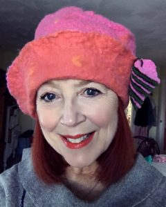 me wearing Bon Bons by Tina pink & orange felt hat, neversaydiebeauty.com
