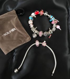 Soufeel charm bracelets and pouch they came in, neversaydiebeauty.com