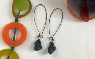 cropped photo of Chrysalism raw gemstone dangle earrings, neversaydiebeauty.com