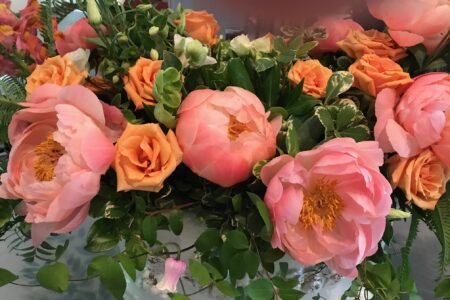 floral display of peach colored peonies and roses at the Museum of Fine Arts Boston, neversaydiebeauty.com