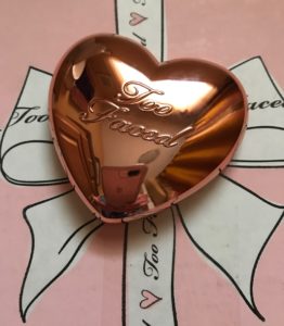 Too Faced Love Light Highlighter compact, shade Ray of Light rose gold, neversaydiebeauty.com