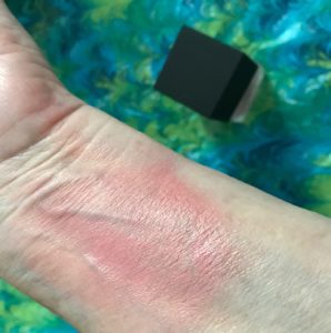 swatch rubbed in of NARS Liquid Blush in Orgasm, neversaydiebeauty.com
