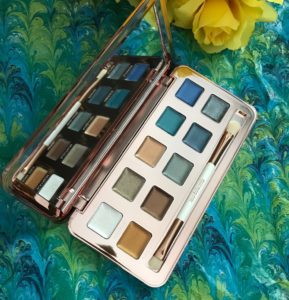 ModelsOwn Colour Chrome eyeshadow palette, open to show mirror, brush, 10 cream shadows and their names, neversaydiebeauty.com