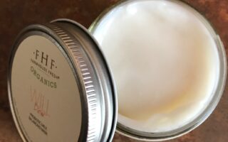 open jar of Farmhouse Fresh Will Dew Probiotic Milk Balancing Mask show the milky looking mask, neversaydiebeauty.com