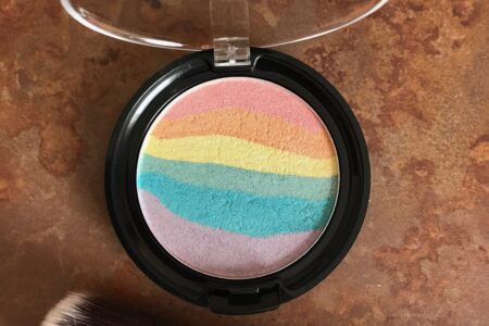 Wet N Wild Color Icon Rainbow Highlighter, shade Unicorn Glow, open to show colored stripes, neversaydiebeauty.com