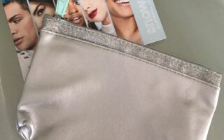 Ipsy Snow Glow silver faux leather makeup bag and product card, neversaydiebeauty.com