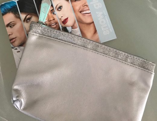 Ipsy Snow Glow silver faux leather makeup bag and product card, neversaydiebeauty.com
