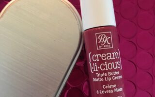 a tube of RK by KISS Cream.li.cious Triple Butter Matte Lip Cream in Berry In Love, neversaydiebeauty.com