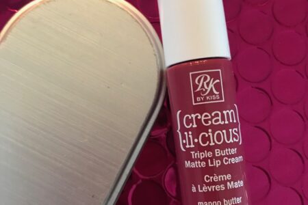 a tube of RK by KISS Cream.li.cious Triple Butter Matte Lip Cream in Berry In Love, neversaydiebeauty.com