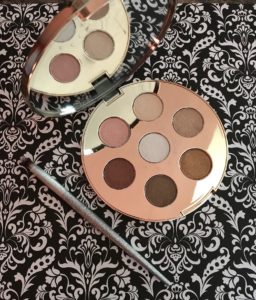 the BECCA Apres Ski Eye Lights shadow palette open to show shades and mirror, neversaydiebeauty.com