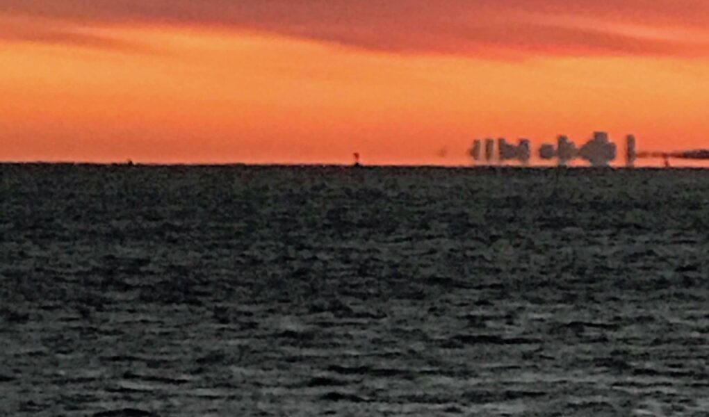 view of Boston in the distance from Niles Beach Gloucester MA, neversaydiebeauty.com