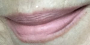 me wearing Finding Ferdinand mini lipstick shade Au Naturel, a nude pink, neversaydiebeauty.com