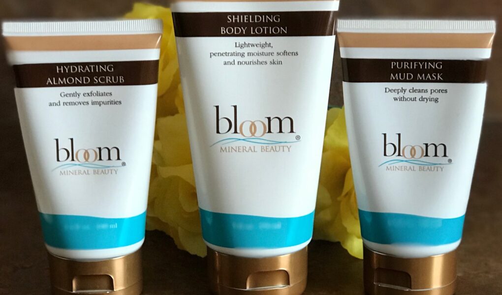 Bloom Minerals Hydrating Almond Scrub, Shielding Body Lotion and Purifying Mud Mask tubes, neversaydiebeauty.com