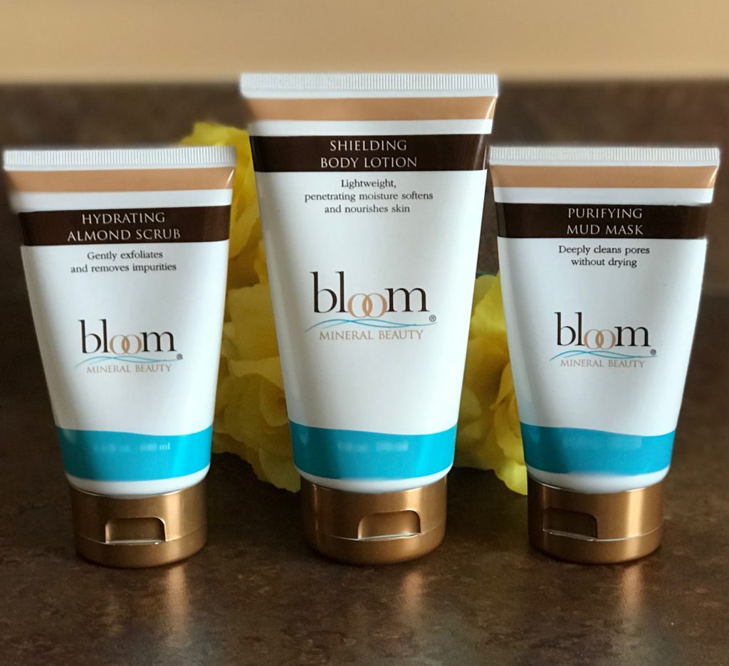 Bloom Minerals Hydrating Almond Scrub, Shielding Body Lotion and Purifying Mud Mask tubes, neversaydiebeauty.com