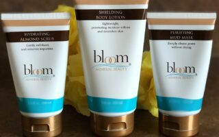 Bloom Minerals Hydrating Almond Scrub, Shielding Body Lotion and Purifying Mud Mask tubes, neversaydiebeauty.com