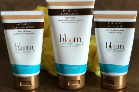 Bloom Minerals Hydrating Almond Scrub, Shielding Body Lotion and Purifying Mud Mask tubes, neversaydiebeauty.com