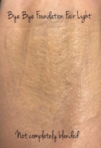 incompletely blended Bye Bye Foundation from IT Cosmetics in shade Fair Light, neversaydiebeauty.com