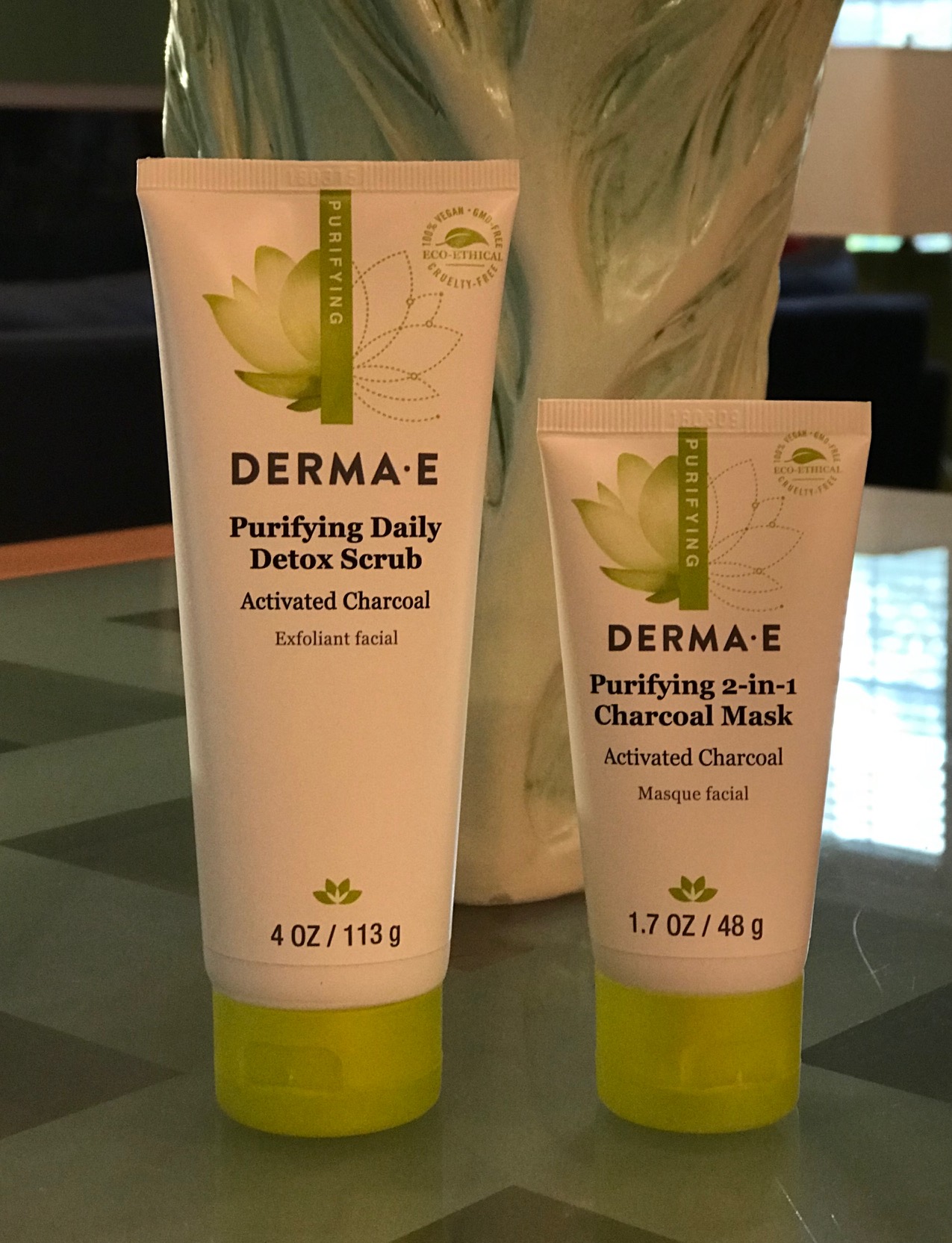 standing tubes of Derma E Purifying Daily Detox Scrub & 2-in-1 Charcoal Mask, neversaydiebeauty.com