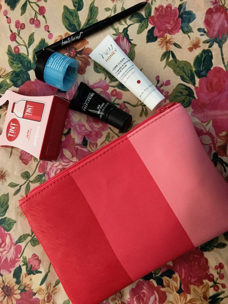 Ipsy Flying Colors makeup bag in pink, salmon, coral and the cosmetics from the bag, neversaydiebeauty.com