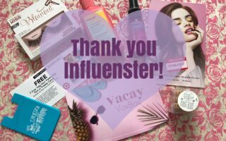 contents of my Influenster Vacay box of beauty products and the words, Thank you Influenster, neversaydiebeauty.com