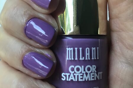 bottle of Milani Color Statement Nail Lacquer, shade Imperial Purple, and my nails wearing it, neversaydiebeauty.com