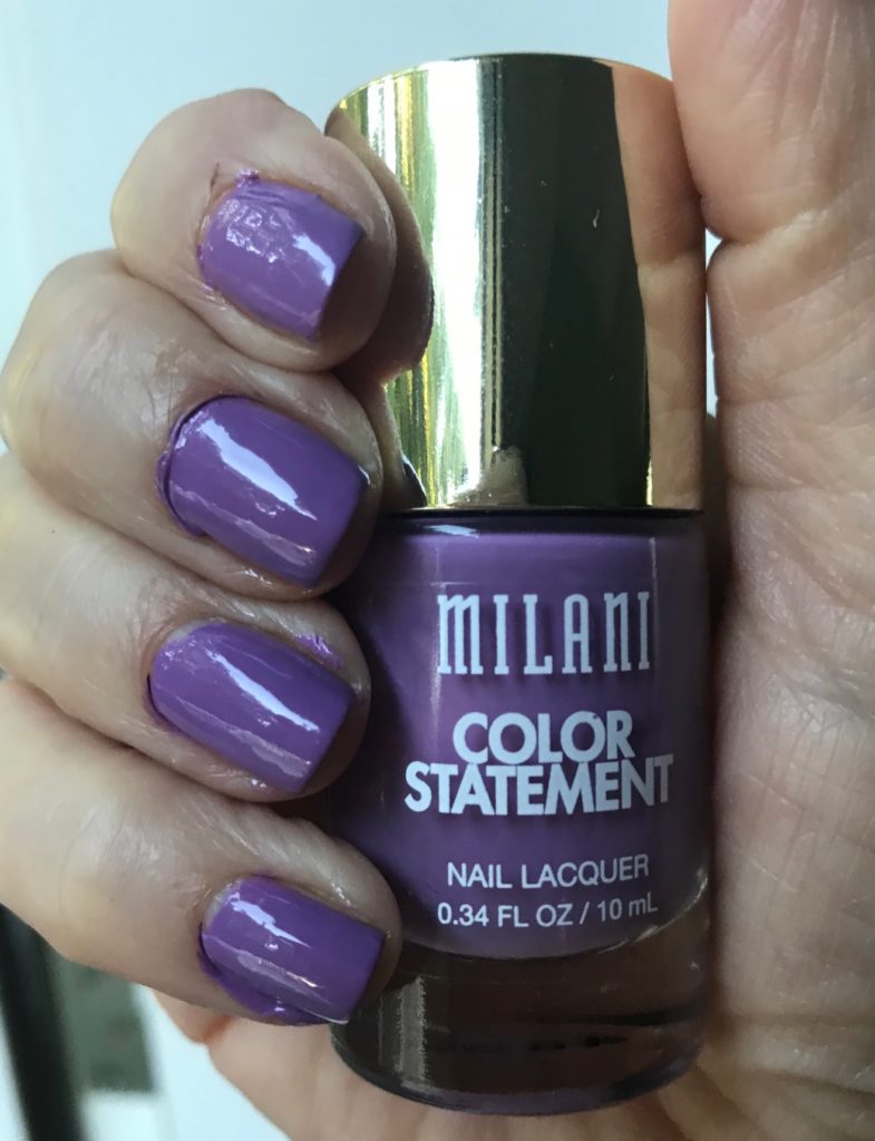 bottle of Milani Color Statement Nail Lacquer, shade Imperial Purple, and my nails wearing it, neversaydiebeauty.com