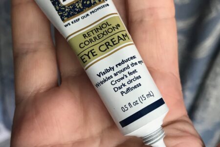 RoC Retinol Correxxion Eye Cream tube and a blob of the white, lightweight cream, neversaydiebeauty.com