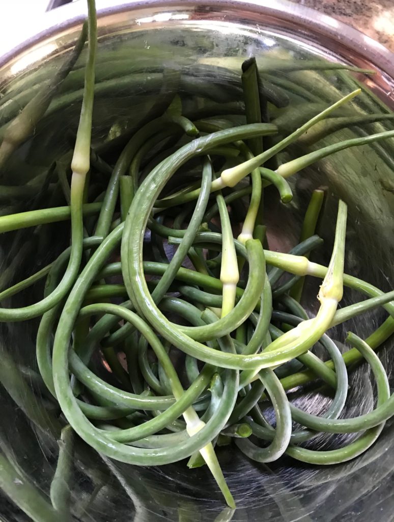 garlic scapes, cleaned and cut in half, neversaydiebeauty.com
