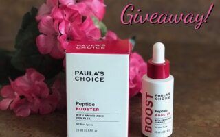 Paula's Choice Peptide Booster bottle and box with giveaway title, neversaydiebeauty.com