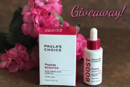 Paula's Choice Peptide Booster bottle and box with giveaway title, neversaydiebeauty.com