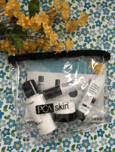 PCA Skin Summertime Essentials cosmetics bag with skincare minis, neversaydiebeauty.com